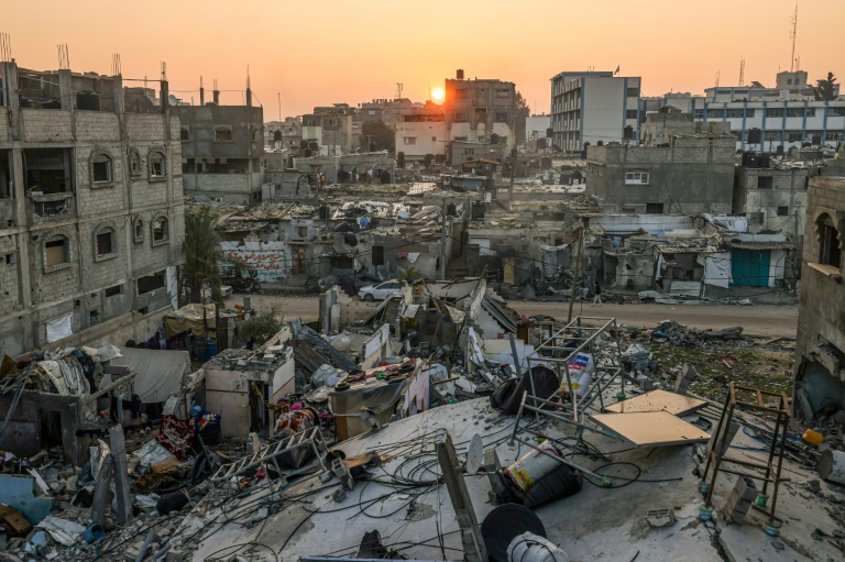 The sun rises above the Rafah refugee camp in the southern Gaza Strip