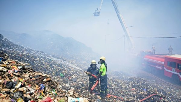 The world's landfills, like this one in Chennai, India, are a major source of planet-warming emissions