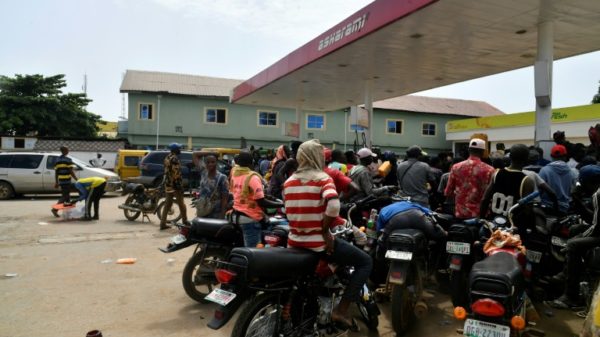 Consumers rushed to buy petrol on Tuesday after newly-elected President Bola Tinubu announced the end to Nigeria's costly fuel subsidies