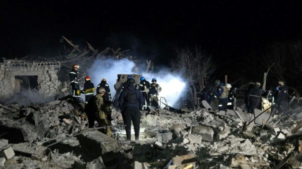 Rescuers worked at the site of the eastern Ukrainian town of Pokrovsk after a missile attack