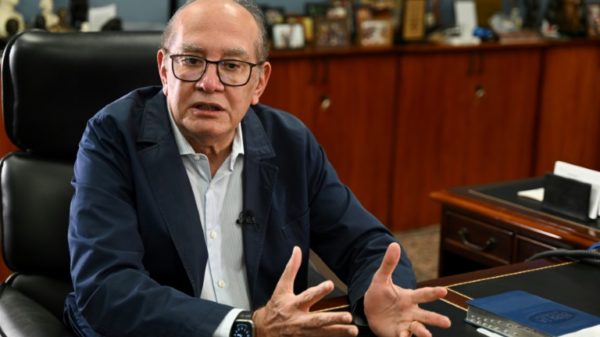 Brazilian Supreme Court Justice Gilmar Mendes says the high court must decide whether far-right former president Jair Bolsonaro is guilty of a crime for his alleged links to the January 8, 2023 riot in Brasilia by thousands of his supporters