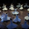 Whirling dervishes perform dances celebrating the teachings of mystic Sufi poet Rumi