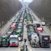 The protesters blocked one of the main roads through central Berlin near the Brandenburg Gate, dumping manure on the road