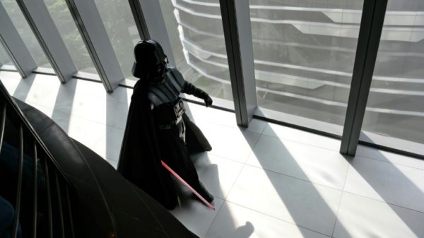 A staff member dressed as Darth Vader is seen at Lucasfilm's Sandcrawler building in Singapore in 2014