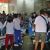 Patients are evacuated from a hospital in Butuan City after a magnitude 7.6 earthquake struck the southern Philippines