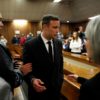 Oscar Pistorius (C) was found guilty of murder and given a 13-year jail sentence in 2017