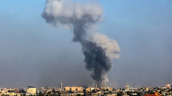 Smoke billows over Khan Yunis in the southern Gaza Strip during Israeli bombardment