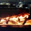 A Japan Airlines plane was in flames on the runway of Tokyo's Haneda Airport on Tuesday after apparently colliding with a coast guard aircraft
